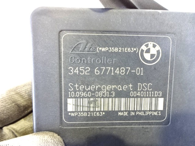 ABS AGREGAT S PUMPO OEM N. 34516771486 ORIGINAL REZERVNI DEL BMW SERIE 1 BER/COUPE/CABRIO E81/E82/E87/E88 (2003 - 2007) BENZINA LETNIK 2005